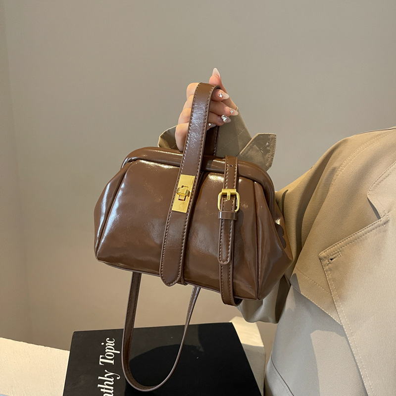 Free Shipping Designer Bag New Handheld Korean Edition Women's Niche Design Bucket Irregular Handbag Crossbody Bag