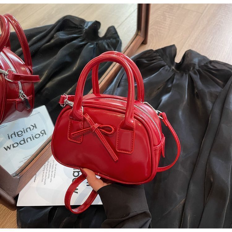 Free Shipping 2025 New Designer Bag Fashion Texture Oil Wax Leather Luxury Wallet Handheld Bowling Bag Niche Trend Bow Multifunctional Handbag