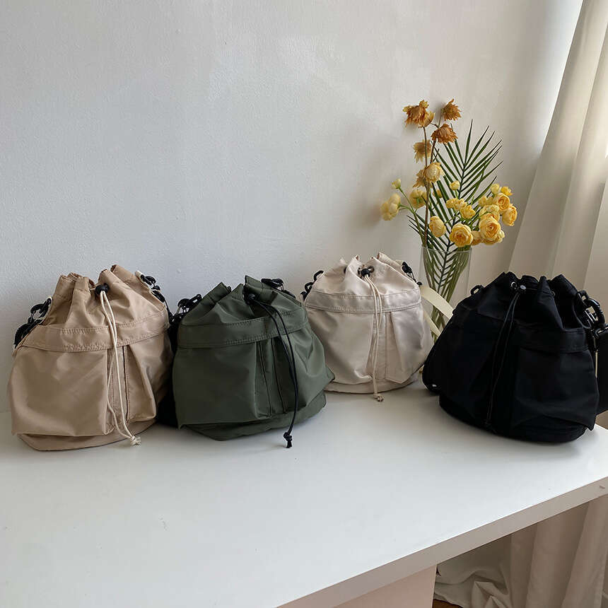 Single Shoulder for Women Versatile Large Capacity 2023 New Nylon Handbag Niche High-end Drawstring Underarm Crossbody Bag