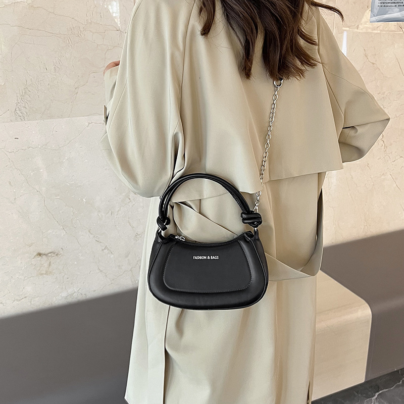 Free Shipping 2025 New Designer Bag Retro Hard Shell Printed Letter Handbag Luxury Wallet Fashion Trend High-quality Shoulder Bag