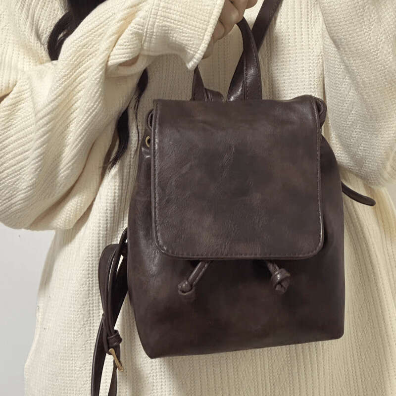 Compact Brown Student Backpack 2025 New PU Soft Leather Texture Simple Versatile Commuter Bag