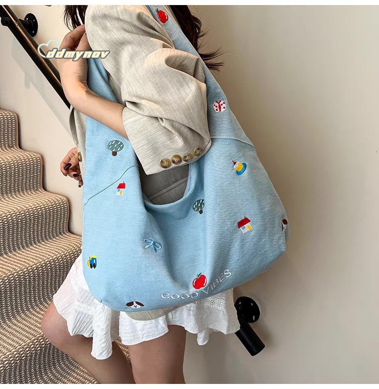 2025 Korean Style Embroidered Denim Crossbody for Women New Niche Large Capacity Commuter Canvas Shoulder Tote Bag ddmynov