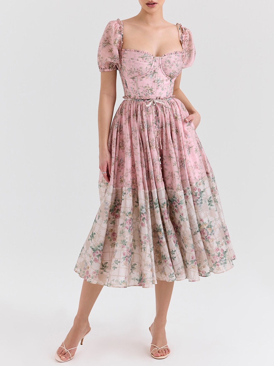 French-style sweet floral dress with plunging neckline and backless design, cinched at the waist for a slimming effect and a sophisticated look. Women