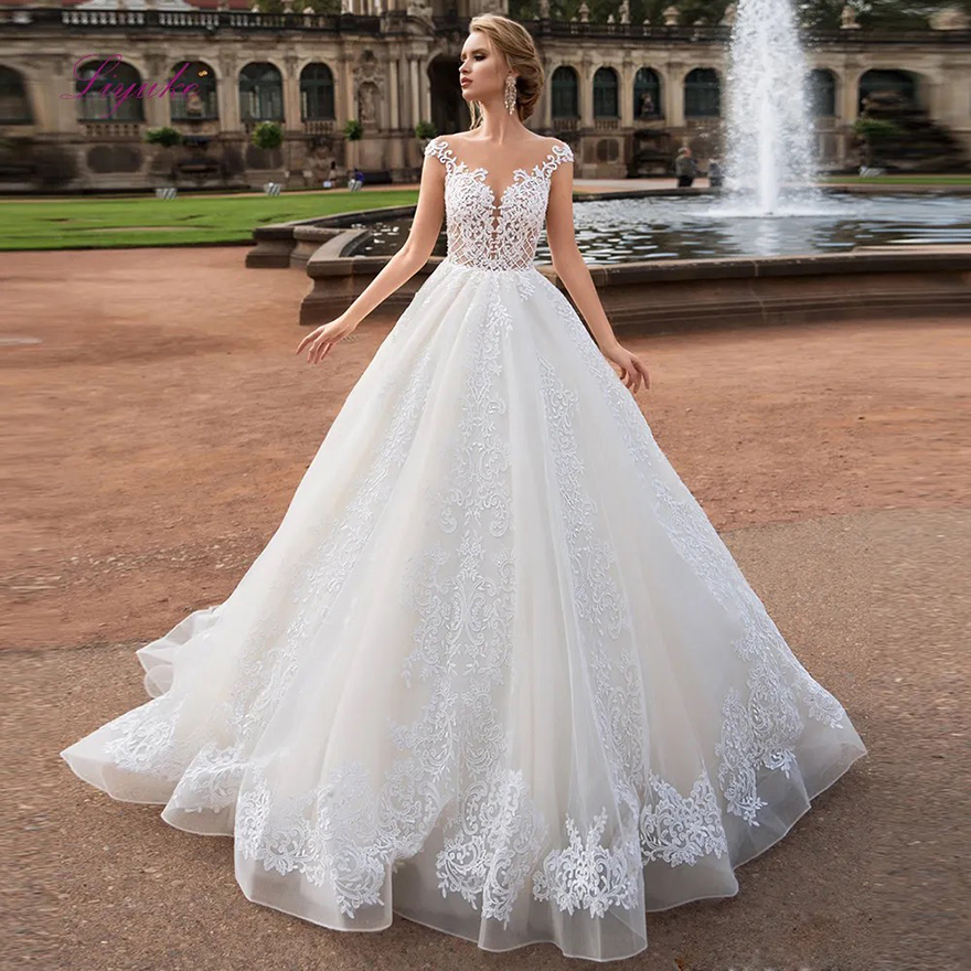 Sheer Cap Sleeves Lace A Line Wedding Dresses Mesh Top Applique Open Back Bridal Wedding Gowns robes de mariee