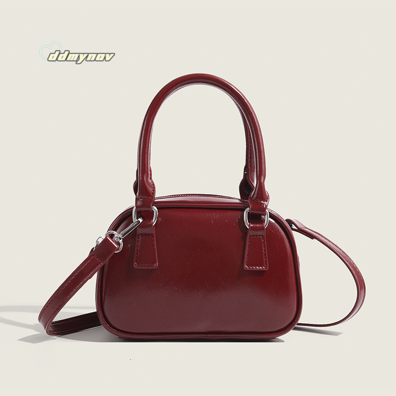 2025 New Red Underarm for Women Korean Style Niche Design Handheld Small Square Light Luxury Crossbody Bowling Bag ddmynov