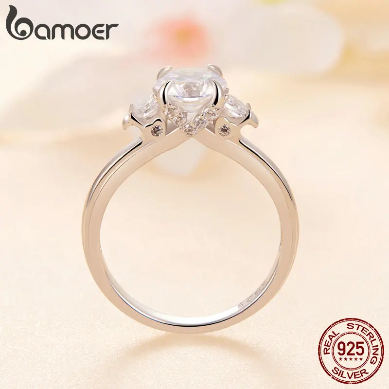 BAMOER Diamond Platinum Plated Classic Round Moissanite Ring Three Stone Engagement Ring for Women D Color VVS1 EX Fine Jewelry Wedding Ring MSR022