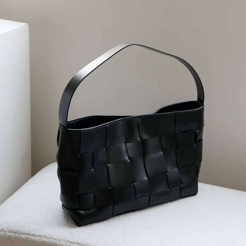 French genuine leather woven tote 2025 new niche design first layer cowhide large capacity vintage ladies shoulder bag