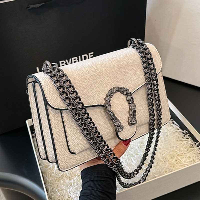 Free shipping 2025 designer women's luxury fashion new chain shoulder crossbody bag Korean version black brown
