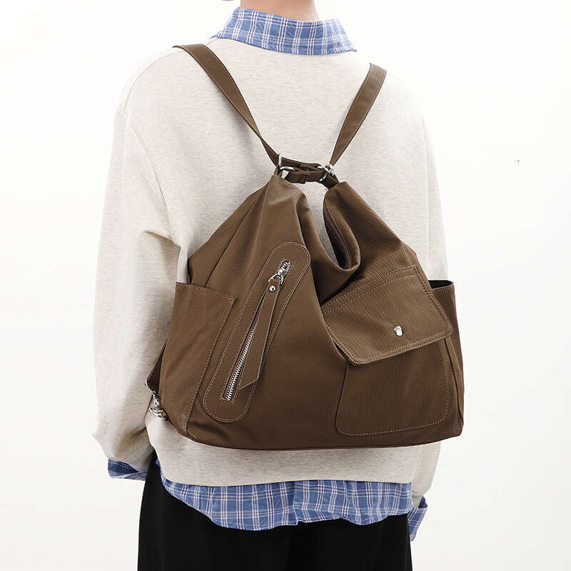 This Year's Spring and Autumn New Women's Large Capacity Waterproof PU Shoulder Bag Fashion Versatile Unisex Backpack