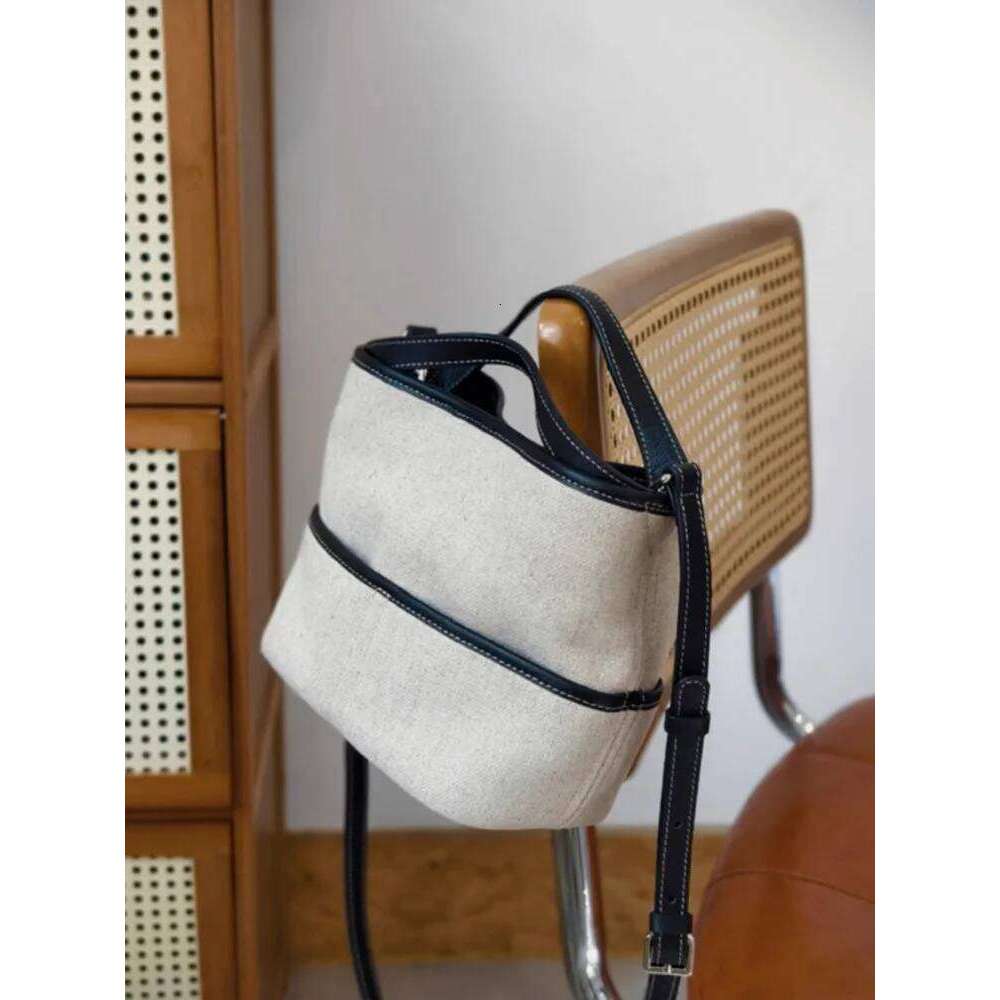 Summer Women Office Designer Totes Handbag Cow Leather Spliced Canvas Bucket Shoulder Underarm Casual Holiday Beach Bag 2025/06/10