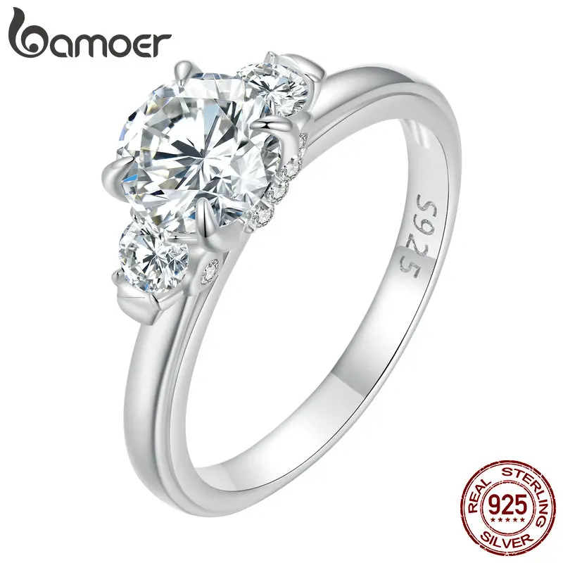 BAMOER Diamond Platinum Plated Classic Round Moissanite Ring Three Stone Engagement Ring for Women D Color VVS1 EX Fine Jewelry Wedding Ring MSR022