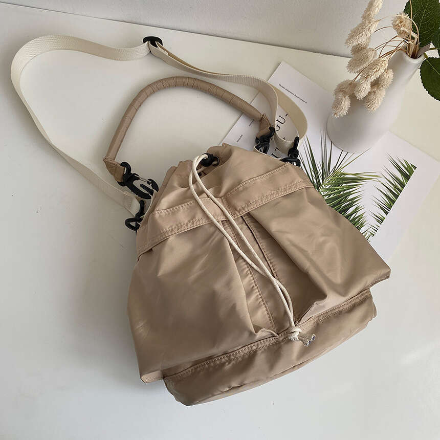 Single Shoulder for Women Versatile Large Capacity 2023 New Nylon Handbag Niche High-end Drawstring Underarm Crossbody Bag