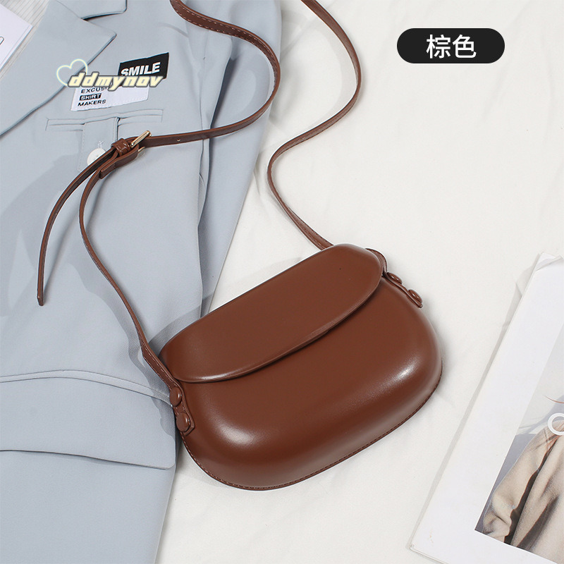 Hot Selling Women's Versatile 2025 Autumn Winter New Large Shell Saddle Student Party Shoulder Crossbody Small Bag ddmynov