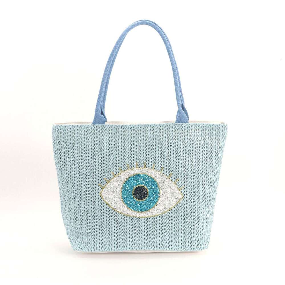 New Canvas Fashion Beach Niche Embroidered Eye Handheld Paper Straw Large Capacity Crossbody Bag