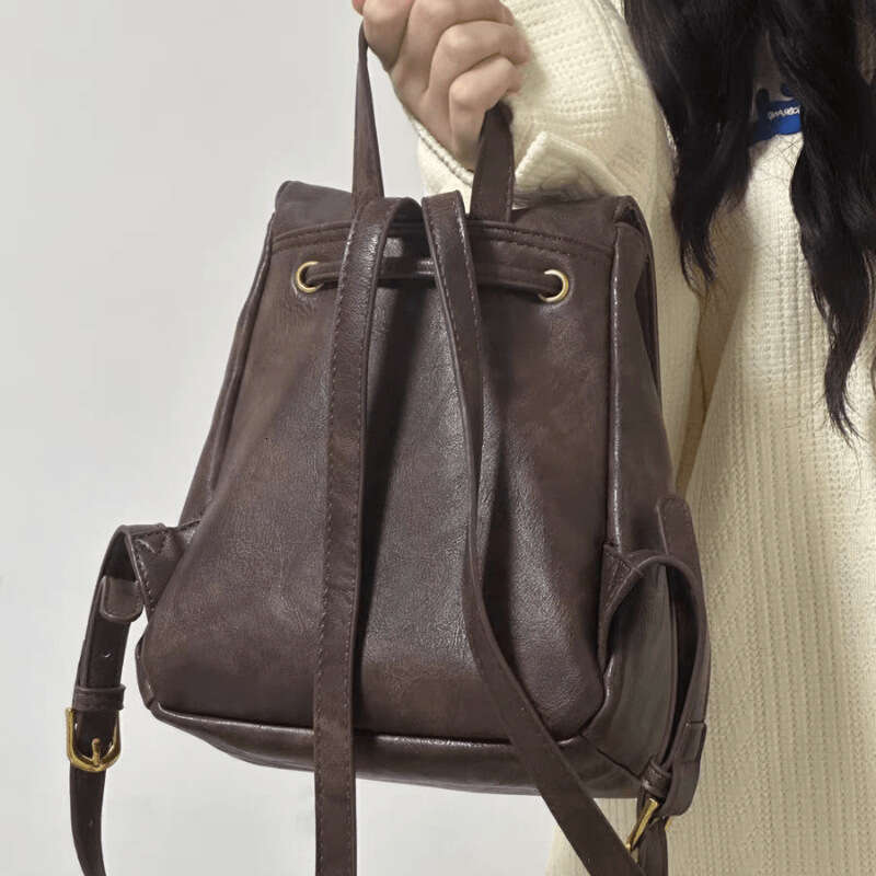 Compact Brown Student Backpack 2025 New PU Soft Leather Texture Simple Versatile Commuter Bag