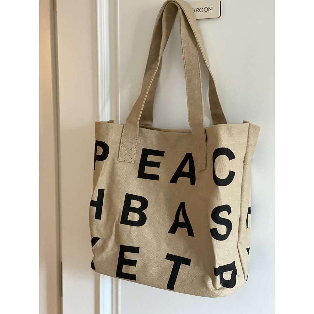 2023 Korean Style Custom Magnetic Buckle Horizontal Version Sturdy Thick New Oversized Letter Inner Pocket Tote Canvas Bag Trendy