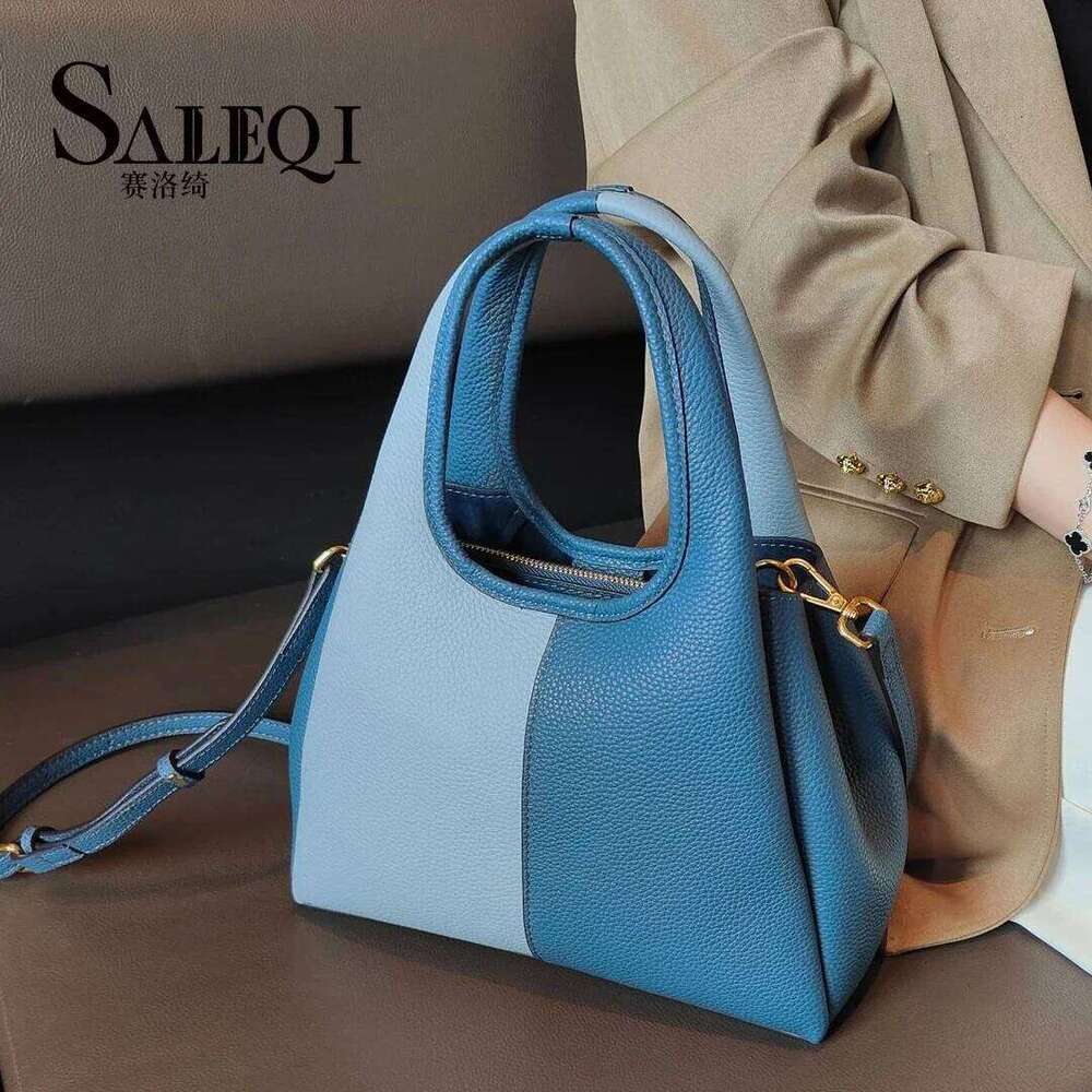 Genuine Leather New Vegetable Basket Handbag Simple And Versatile The Korean Version Of The Contrasting Color Commuting Bag 2025/06/10