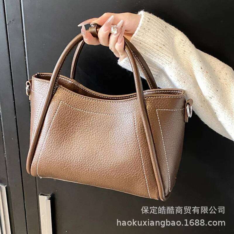Retro Minimalist Hand-Held Bucket New Niche High-End Single Shoulder Bag, Casual Versatile Women's Bag