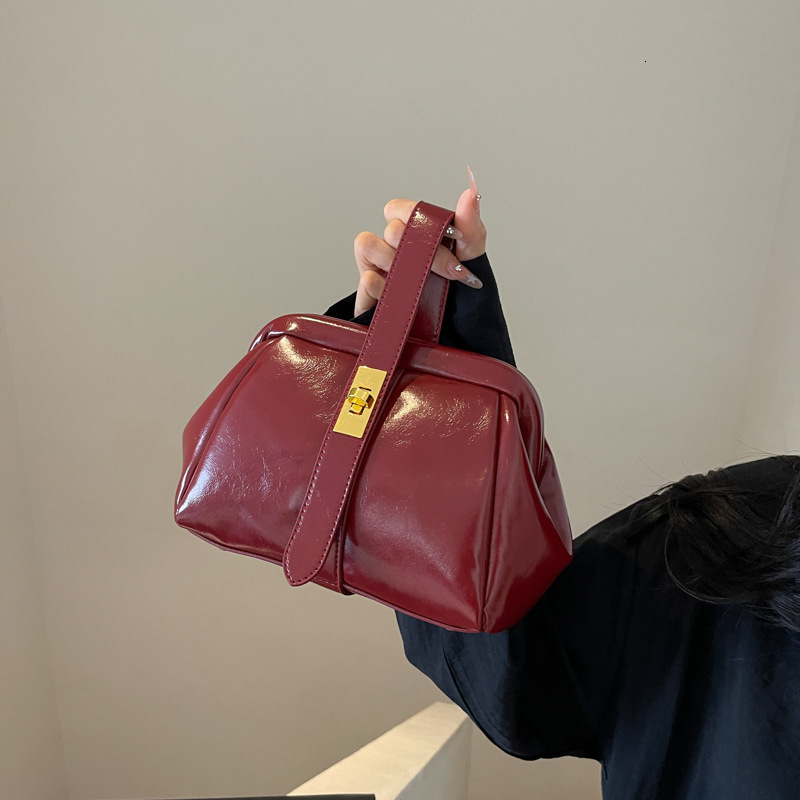 Free Shipping Designer Bag New Handheld Korean Edition Women's Niche Design Bucket Irregular Handbag Crossbody Bag