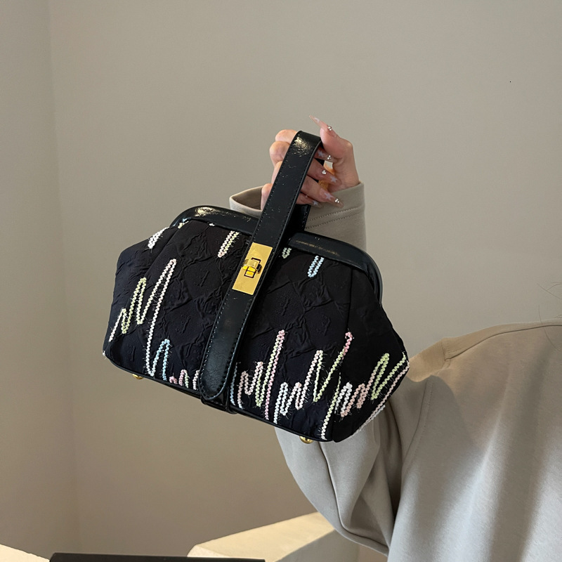 Free Shipping Designer Bag New Handheld Korean Edition Women's Niche Design Bucket Irregular Handbag Crossbody Bag