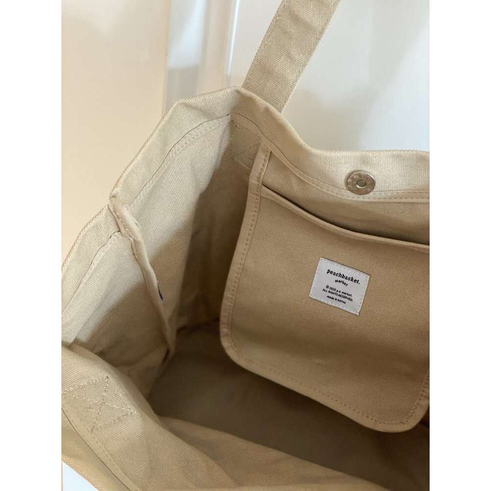 2023 Korean Style Custom Magnetic Buckle Horizontal Version Sturdy Thick New Oversized Letter Inner Pocket Tote Canvas Bag Trendy