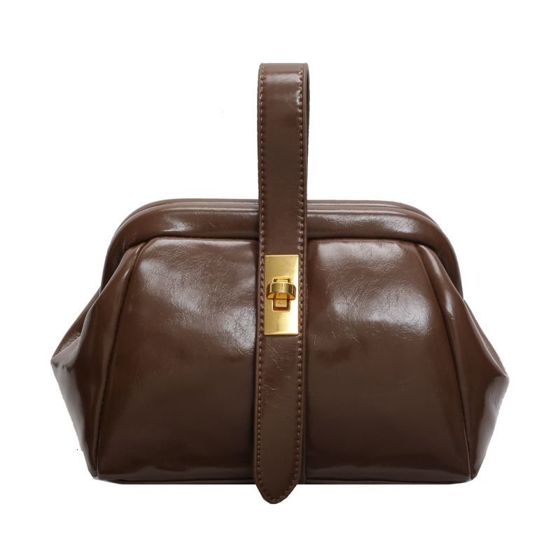 Free Shipping Designer Bag New Handheld Korean Edition Women's Niche Design Bucket Irregular Handbag Crossbody Bag