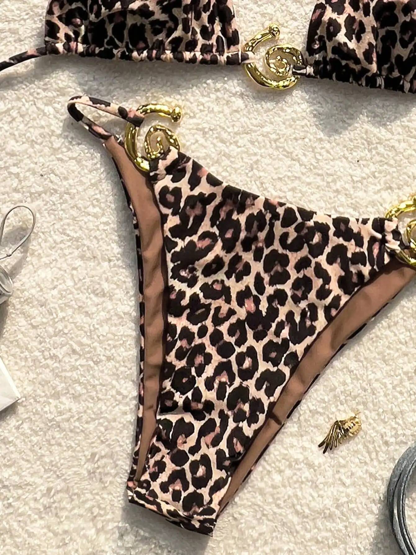 Leopard print bikini halterneck lace-up triangle small chest gathered split swimsuit is suitable for surfing vacations by the se