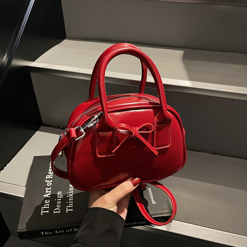 Free Shipping 2025 New Designer Bag Fashion Texture Oil Wax Leather Luxury Wallet Handheld Bowling Bag Niche Trend Bow Multifunctional Handbag