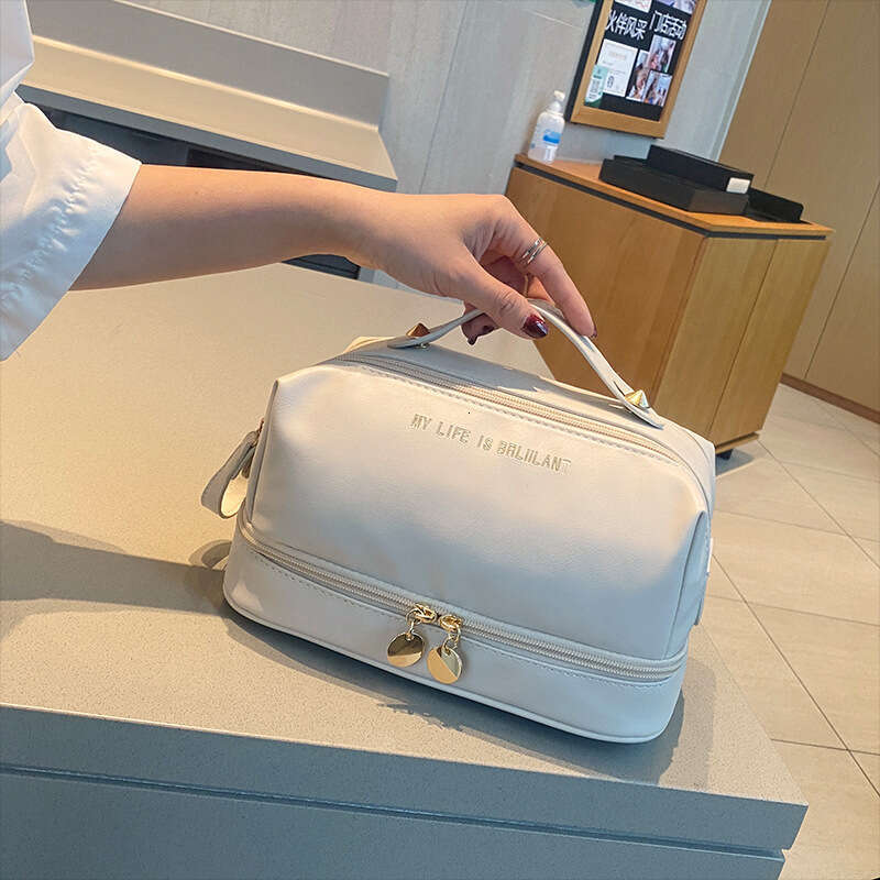 2025 New PU Leather Handheld Makeup Large Capacity Divider Board Skincare Storage Simple Waterproof Toiletry Bag