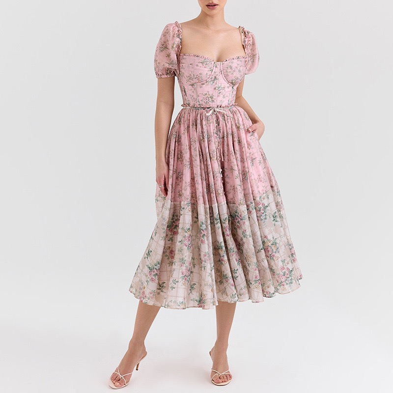 French-style sweet floral dress with plunging neckline and backless design, cinched at the waist for a slimming effect and a sophisticated look. Women