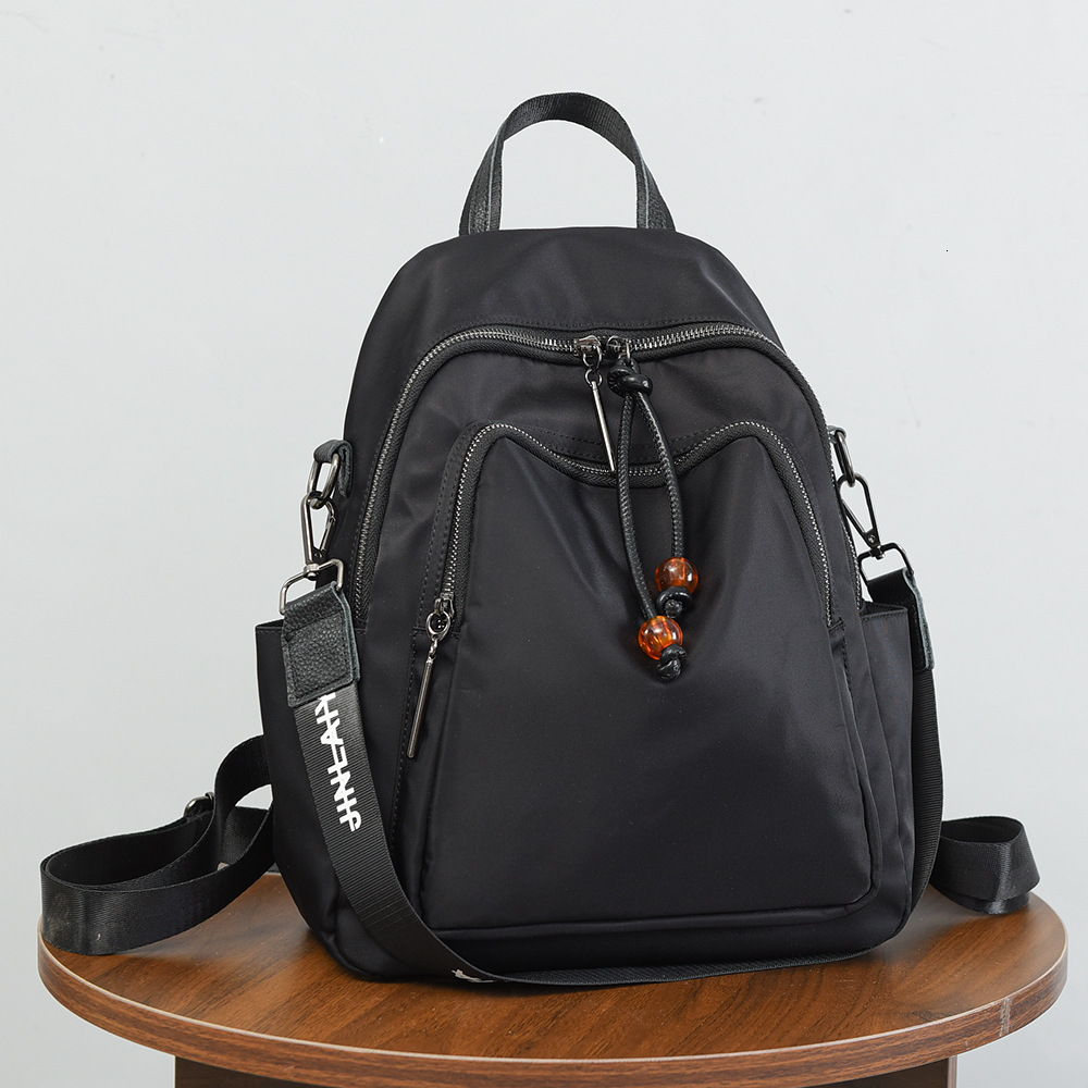 Women's 2025 New Oxford Cloth Commuter Waterproof Wear-resistant Fashionable Double Shoulder Backpack Bag
