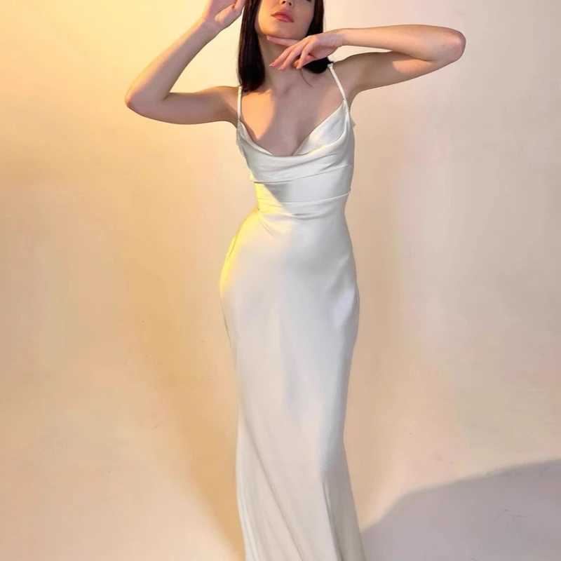 Europe and America 2025 foreign trade spring and summer temperament sexy solid color stitching with slim suspenders long dress XJ250610