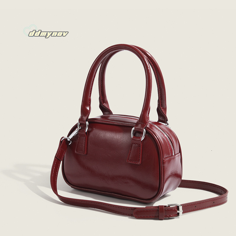 2025 New Red Underarm for Women Korean Style Niche Design Handheld Small Square Light Luxury Crossbody Bowling Bag ddmynov