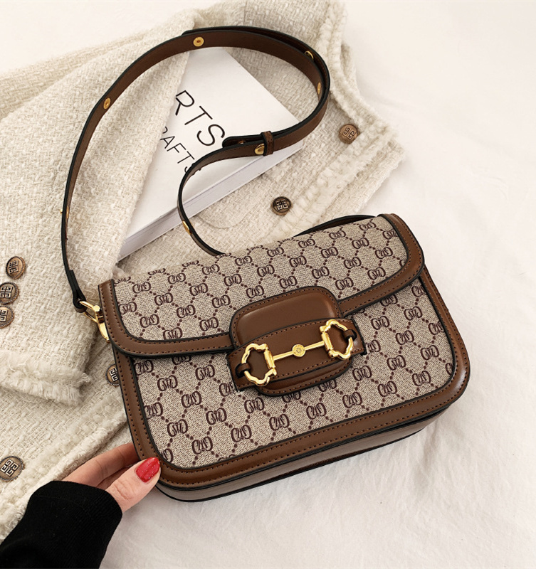 Free shipping 2025 new designer high-end women's bag fashion temperament printed small square bag saddle bag versatile shoulder crossbody bag bla