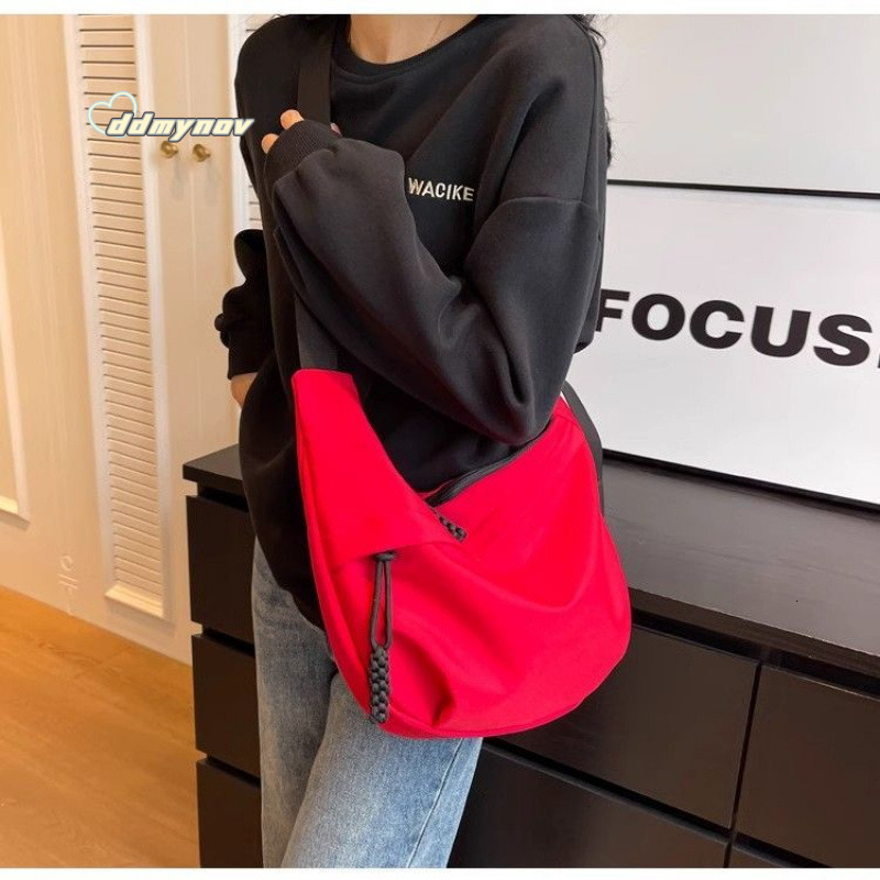 2025Dumpling for Women New Sports Casual Oxford Cloth Shoulder Versatile Crossbody Travel Large Capacity Crescent Bag ddmynov