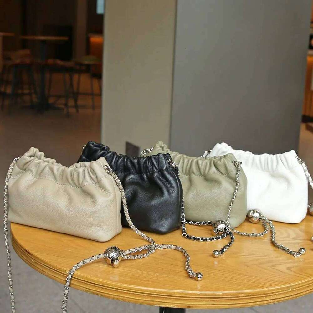 First Layer Cowhide Cloud Dumpling 2025 New Niche Design Small Gold Ball Chain Shoulder Fashion Women's Crossbody Bag