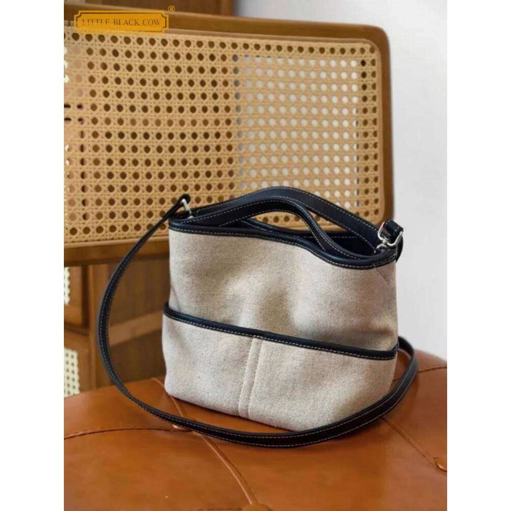Summer Women Office Designer Totes Handbag Cow Leather Spliced Canvas Bucket Shoulder Underarm Casual Holiday Beach Bag 2025/06/10