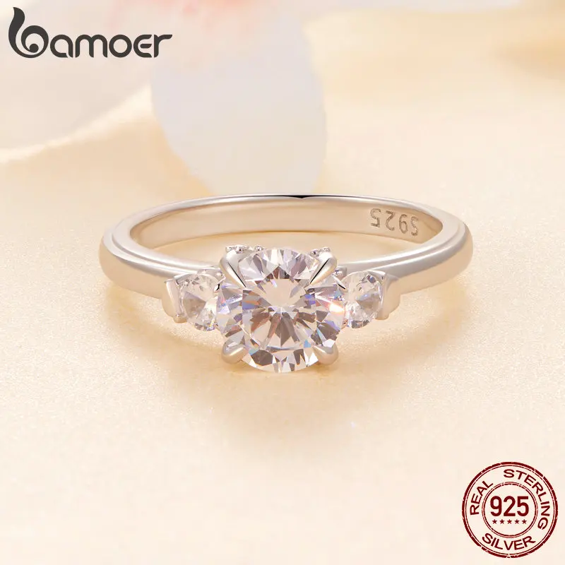 BAMOER Diamond Platinum Plated Classic Round Moissanite Ring Three Stone Engagement Ring for Women D Color VVS1 EX Fine Jewelry Wedding Ring MSR022