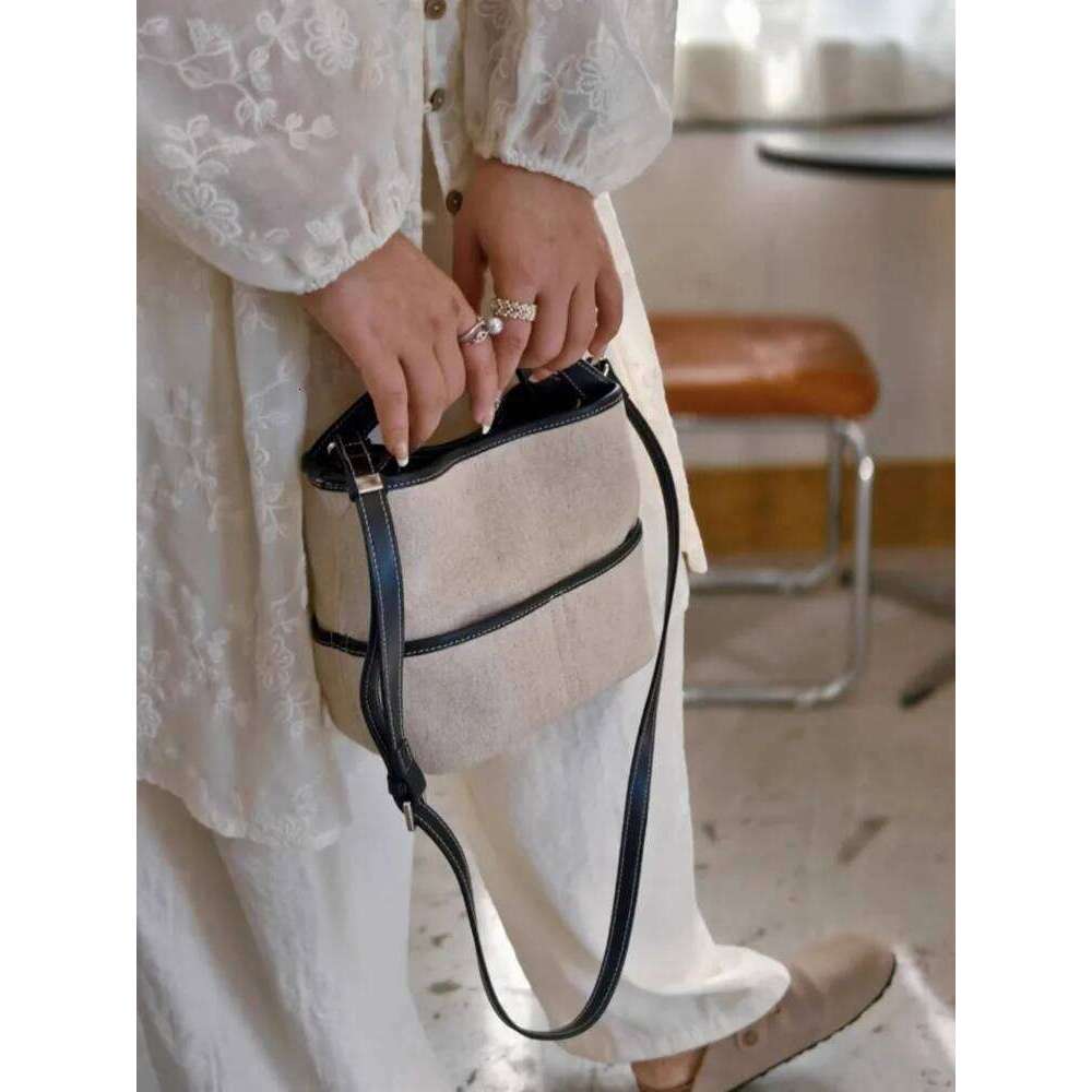 Summer Women Office Designer Totes Handbag Cow Leather Spliced Canvas Bucket Shoulder Underarm Casual Holiday Beach Bag 2025/06/10