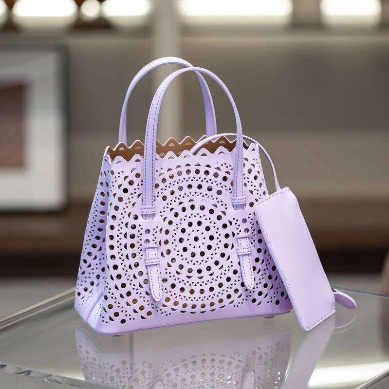 New High-End Cowhide Basket Handbag Commuter Crossbody Bags Women's Wave Hollow Shoulder Bag Wholesale Price