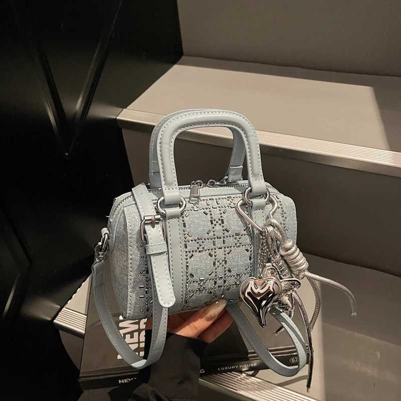 Korean version simple and versatile hand-held bowling bag 2025 new fashionable bow denim shoulder bag temperament womens bag XJ250610