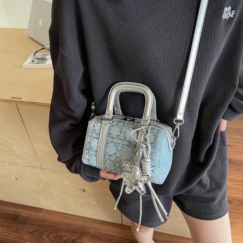 Korean version simple and versatile hand-held bowling bag 2025 new fashionable bow denim shoulder bag temperament womens bag XJ250610