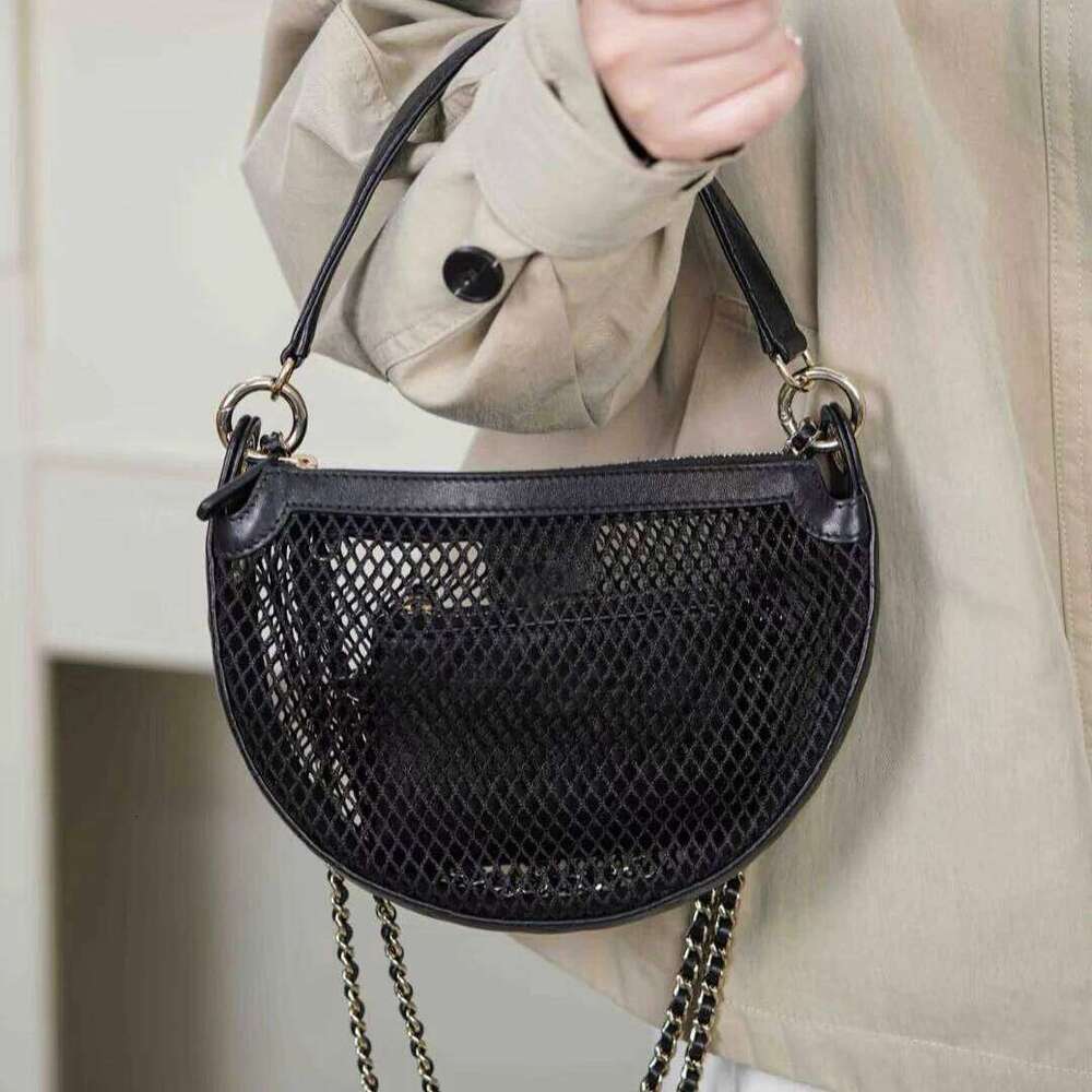 Celebrity style hollow fishing net 2025 new design summer fashion chain one-shoulder crossbody bag women's handbag