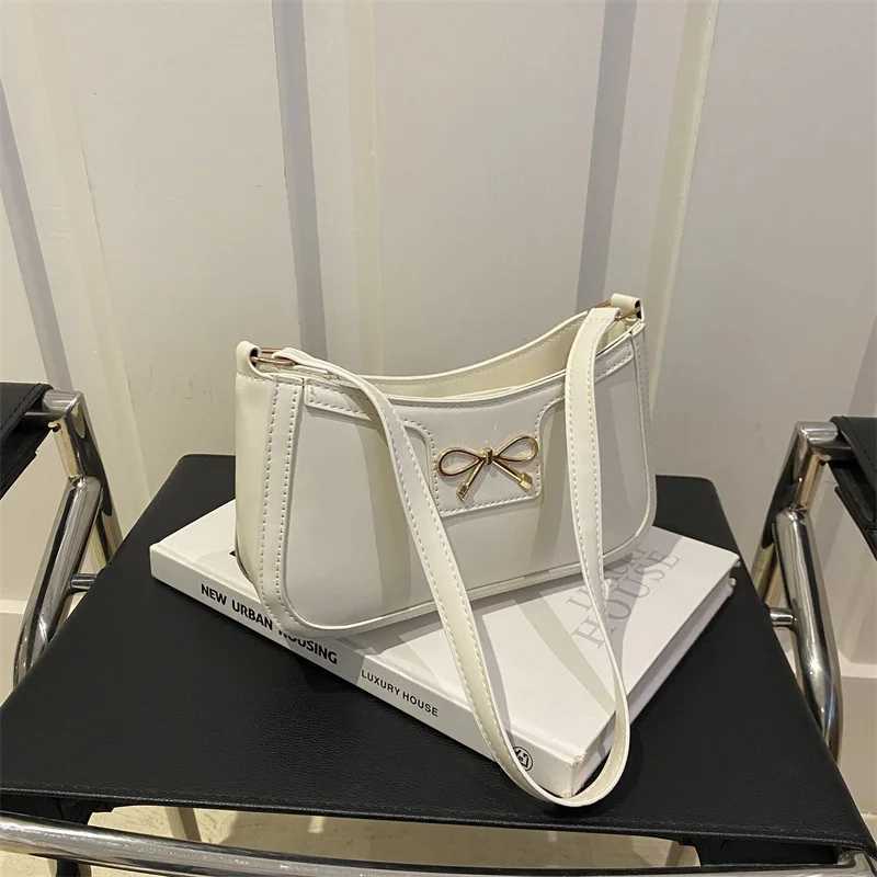 Stylish Shoulder Bag with Metal Bow Decoration Versatile Underarm Bag Classic Brown and Black Baguette Bag for Women Daily UseXJ250610