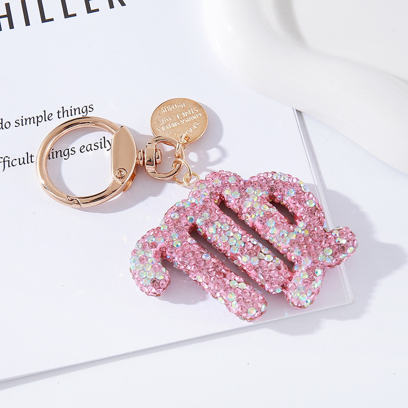 Pink rhinestone constellation car keychain, fashionable, individual and shiny handbag, special constellation pendant for car birthday gifts