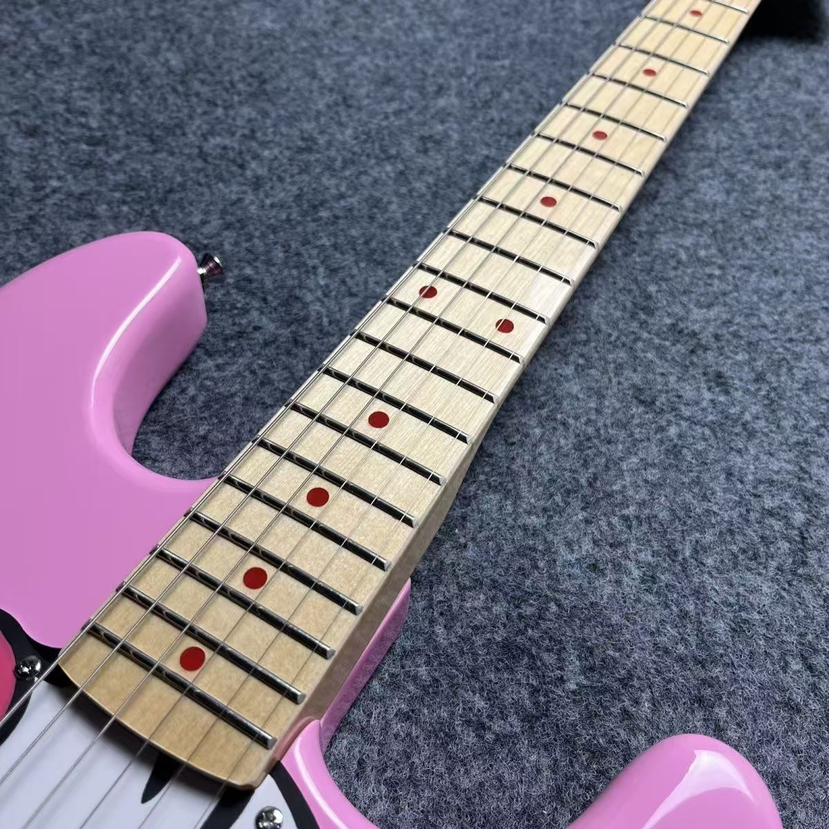 Perfectly Tuned Pink Cartoony Electric Guitar Available for Personalization