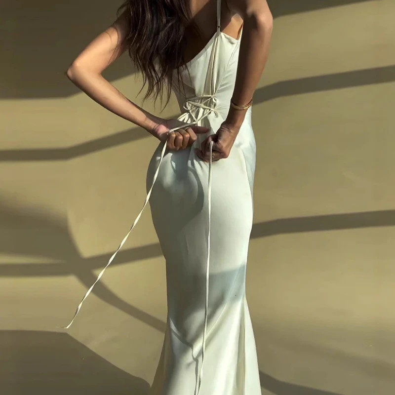 Europe and America foreign trade spring summer temperament sexy solid color stitching with slim suspenders long dress 250611