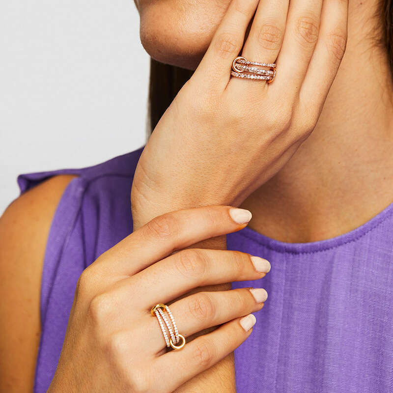 Chic Silver Adorned with Shimmering Diamonds: A Stylish Trifold Engagement Accessory for Her