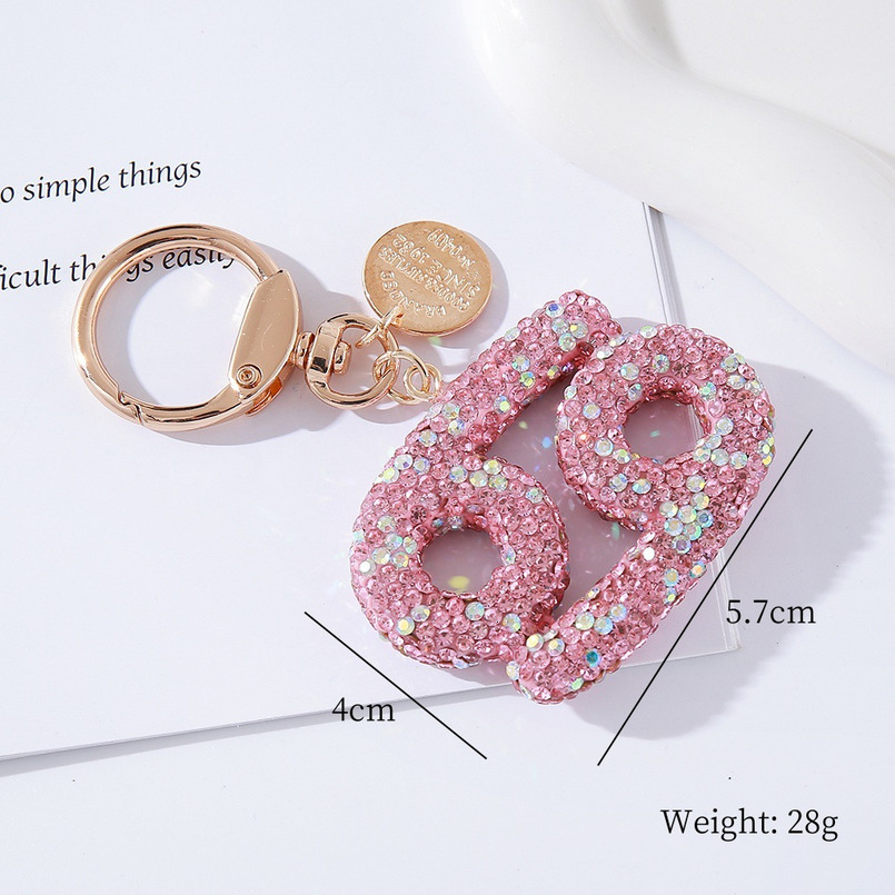 Pink rhinestone constellation car keychain, fashionable, individual and shiny handbag, special constellation pendant for car birthday gifts