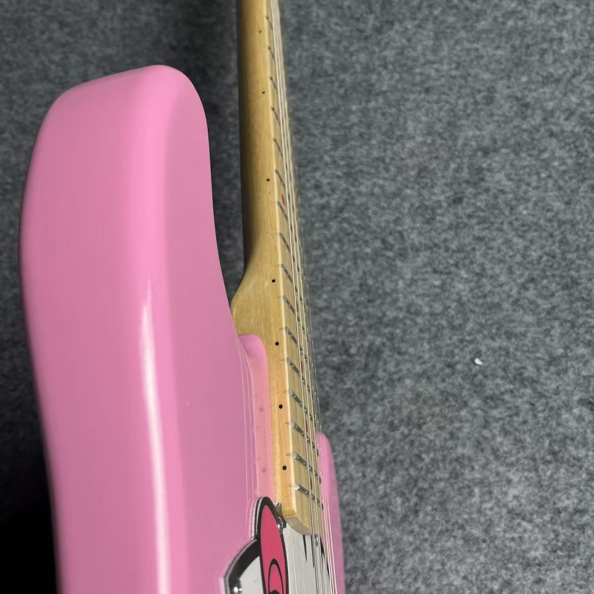 Perfectly Tuned Pink Cartoony Electric Guitar Available for Personalization